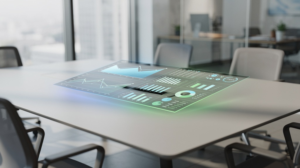 Modern meeting room table with a holographic data visualization projected over its surface, showing analytics charts.